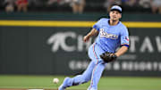 Aug 24, 2025; Arlington, Texas, USA; Texas Rangers shortstop Corey Seager (5) cannot field a ball hit by Cleveland Guardians second baseman Brayan Rocchio (not pictured) during the second inning at Globe Life Field. Mandatory Credit: Jerome Miron-Imagn Images