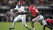 Sep 27, 2025; Athens, Georgia, USA; Alabama Crimson Tide wide receiver Germie Bernard (5) runs against Georgia Bulldogs defensive back Ellis Robinson IV (1) and defensive back KJ Bolden (4) in the second half at Sanford Stadium. Mandatory Credit: Dale Zanine-Imagn Images