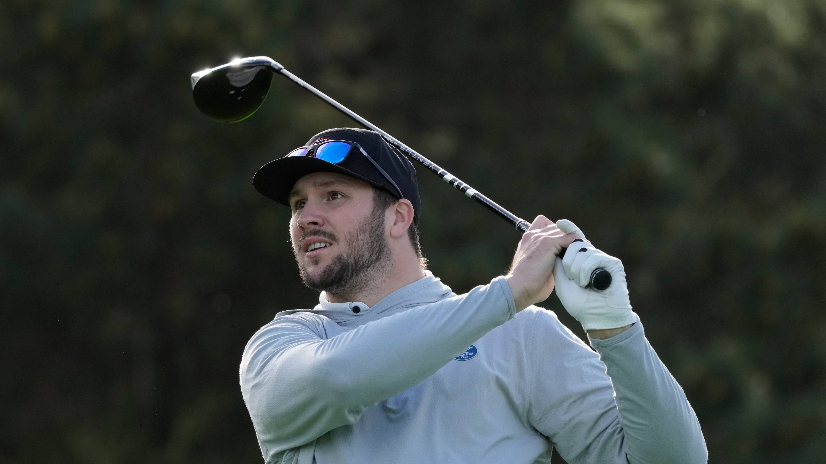 Feb 1, 2024; Pebble Beach, California, USA; Buffalo Bills quarterback Josh Allen hits his tee shot on the 11th hole during the first round of the AT&T Pebble Beach Pro-Am golf tournament at Spyglass Hill Golf Course.