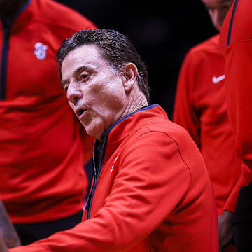Jan 7, 2025; Cincinnati, Ohio, USA; St. John's Red Storm head coach Rick Pitino talks to his team during a timeout in the first half against the Xavier Musketeers at Cintas Center. Mandatory Credit: Katie Stratman-Imagn Images