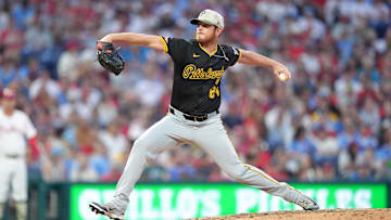 May 17, 2025; Philadelphia, Pennsylvania, USA; Pittsburgh Pirates relief pitcher Caleb Ferguson (64) throws a pitch against the Philadelphia Phillies in the sixth inning at Citizens Bank Park. Mandatory Credit: Kyle Ross-Imagn Images