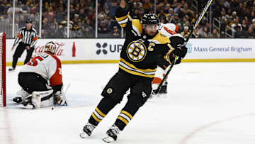 Dec 7, 2024; Boston, Massachusetts, USA; Boston Bruins left wing Brad Marchand (63) celebrates his game tying goal on Philadelphia Flyers goaltender Aleksei Kolosov (35) during the third period at TD Garden. Mandatory Credit: Winslow Townson-Imagn Images