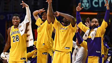 Los Angeles Lakers forward Rui Hachimura (28), center Jaxson Hayes (11), and guard Gabe Vincent (7) celebrate after scoring against the Houston Rockets during the second half at Crypto.com Arena.