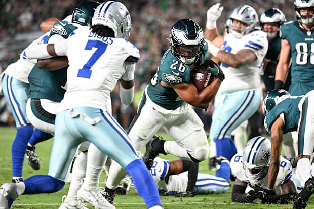 Philadelphia Eagles running back Saquon Barkley carries the ball against the Dallas Cowboys. 