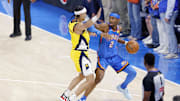 Jun 22, 2025; Oklahoma City, Oklahoma, USA; Oklahoma City Thunder guard Shai Gilgeous-Alexander (2) controls the ball againstIndiana Pacers guard Andrew Nembhard (2) during the first half of game seven of the 2025 NBA Finals at Paycom Center. Mandatory Credit: Alonzo Adams-Imagn Images