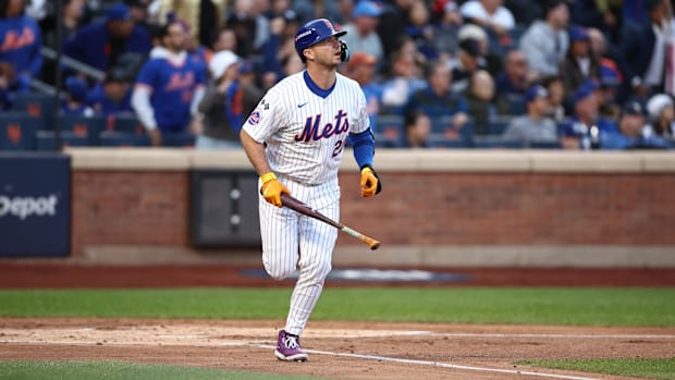 New York Mets first baseman Pete Alonso celebrates his home run during the first inning against the Los Angeles Dodgers.