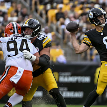 Oct 12, 2025; Pittsburgh, Pennsylvania, USA; Pittsburgh Steelers quarterback Aaron Rodgers (8) attempts to make a pass during the second quarter at Acrisure Stadium. Mandatory Credit: Barry Reeger-Imagn Images
