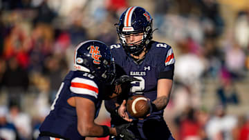Nashville Christian's Jared Curtis (2) hands off to Terry Ward (10) during the second quarter of the Division II-A championship game against Columbia Academy at Finley Stadium in Chattanooga, Tenn., Thursday, Dec. 5, 2024.