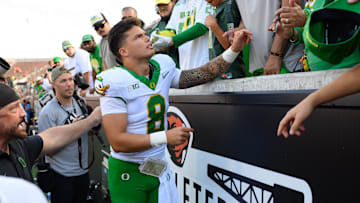 Sep 14, 2024; Corvallis, Oregon, USA; Oregon Ducks quarterback Dillon Gabriel (8) greets fans after the game against the Oregon State Beavers at Reser Stadium. Mandatory Credit: Craig Strobeck-Imagn Images