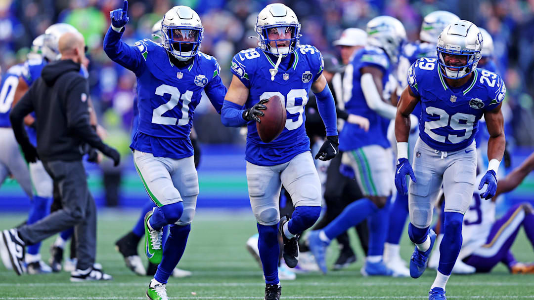 Seattle Seahawks safety Ty Okada (39) celebrates after retrieving a fumble.