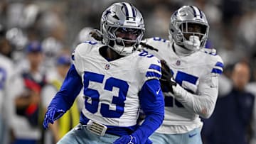 Aug 16, 2025; Arlington, Texas, USA; Dallas Cowboys linebacker James Houston (53) and cornerback Andrew Booth (25) return an interception for a touchdown during the game between the Dallas Cowboys and the Baltimore Ravens at AT&T Stadium. Mandatory Credit: Jerome Miron-Imagn Images
