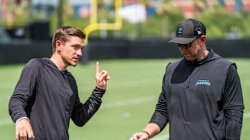 Jacksonville Jaguars general manager James Gladstone, left, talks with Jacksonville Jaguars head coach Liam Coen, right, after the. Jacksonville Jaguars’ mandatory minicamp Tuesday June 10, 2025 at the Miller Electric Center in Jacksonville, Fla. [Doug Engle/Florida Times-Union]