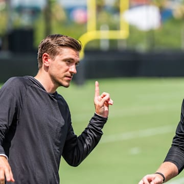Jacksonville Jaguars general manager James Gladstone, left, talks with Jacksonville Jaguars head coach Liam Coen, right, after the. Jacksonville Jaguars’ mandatory minicamp Tuesday June 10, 2025 at the Miller Electric Center in Jacksonville, Fla. [Doug Engle/Florida Times-Union]