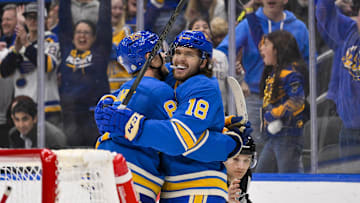 Mar 22, 2025; St. Louis, Missouri, USA;  St. Louis Blues center Robert Thomas (18) celebrates with center Dylan Holloway (81) after scoring against the Chicago Blackhawks during the second period at Enterprise Center. Mandatory Credit: Jeff Curry-Imagn Images