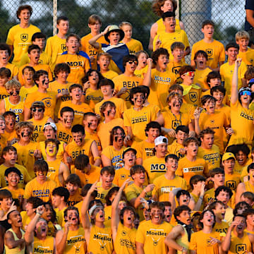 Archbishop Moeller students cheer on the Crusaders against St. Xavier on September 16, 2022.