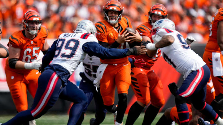 Cincinnati Bengals quarterback Joe Burrow (9) is sacked in the fourth quarter of the NFL Week 1 game between the Cincinnati Bengals and the New England Patriots at Paycor Stadium in downtown Cincinnati on Sunday, Sept. 8, 2024. The Patriots won the season opener, 16-10.