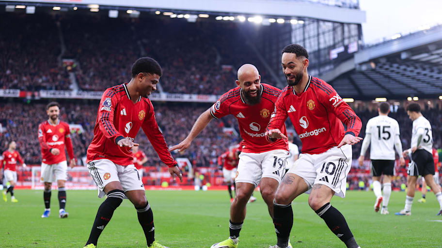 Matheus Cunha (right) celebrating.