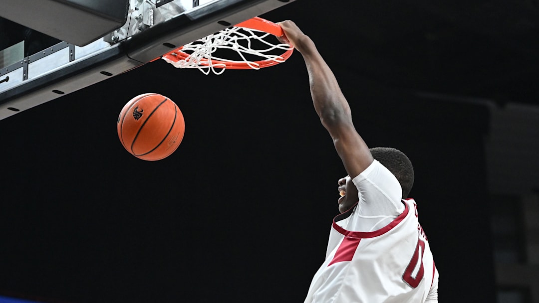 Nov 21, 2024; Spokane, Washington, USA; Duke basketball transfer Cedric Coward (0) dunks the ball against the Eastern Washington Eagles in the second half at Spokane Veterans Memorial Arena. 