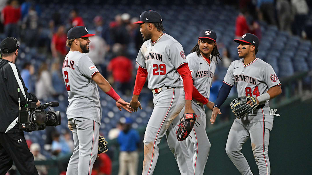 Mar 30, 2026; Philadelphia, Pennsylvania, USA; Washington Nationals second baseman Luis García Jr. (2),  left fielder James Wood (29), shortstop CJ Abrams (5) and second baseman Orbit Vivas (84) celebrates with against the Philadelphia Phillies at Citizens Bank Park. Mandatory Credit: Eric Hartline-Imagn Images