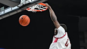 Nov 21, 2024; Spokane, Washington, USA; Washington State Cougars guard Cedric Coward (0) dunks the ball against the Eastern Washington Eagles in the second half at Spokane Veterans Memorial Arena. Washington State Cougars won 96-81. Mandatory Credit: James Snook-Imagn Images