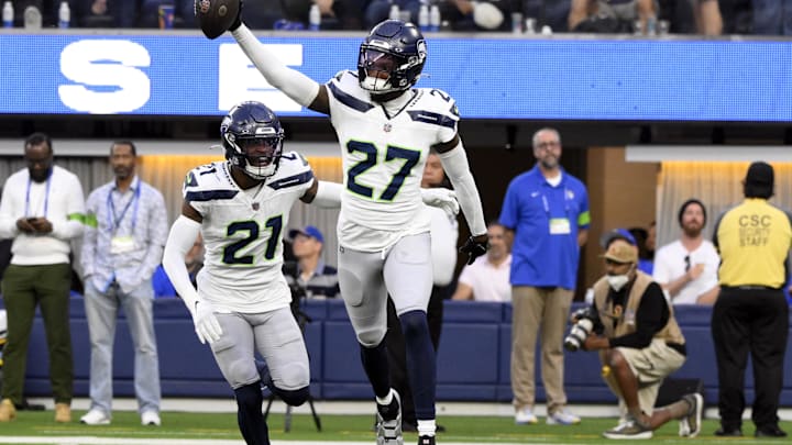 Seattle Seahawks cornerback Riq Woolen celebrates making an interception against the Los Angeles Rams. Seattle Seahawks cornerback Riq Woolen celebrates making an interception against the Los Angeles Rams.