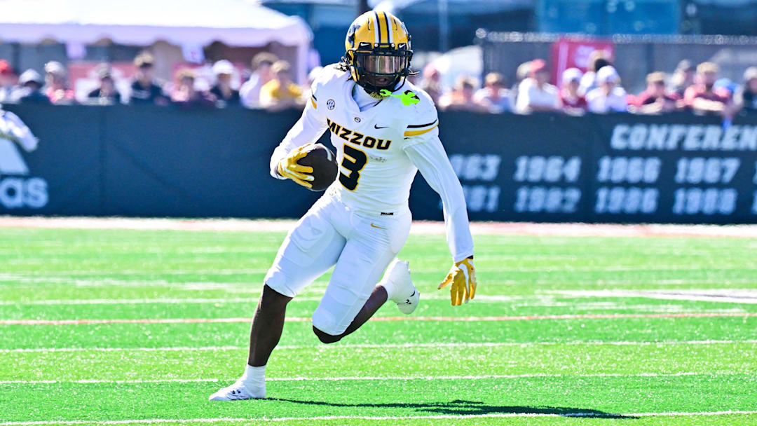 Oct 12, 2024; Amherst, Massachusetts, USA; Missouri Tigers wide receiver Luther Burden III (3)  runs the ball during the first half against the Massachusetts Minutemen at Warren McGuirk Alumni Stadium. Mandatory Credit: Eric Canha-Imagn Images