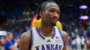 Nov 3, 2025; Lawrence, Kansas, USA; Kansas Jayhawks guard Darryn Peterson (22) reacts after defeating the Green Bay Phoenix at Allen Fieldhouse. Mandatory Credit: Jay Biggerstaff-Imagn Images