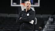 Mar 20, 2025; Milwaukee, WI, USA;  Kentucky Wildcats head coach Mark Pope looks on during NCAA Tournament First Round Practice at Fiserv Forum. Mandatory Credit: Jeff Hanisch-Imagn Images