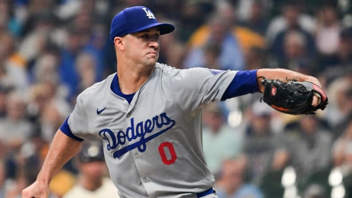 Aug 15, 2024; Milwaukee, Wisconsin, USA; Los Angeles Dodgers starting pitcher Jack Flaherty (0) throws against the Milwaukee Brewers in the first inning at American Family Field. Mandatory Credit: Benny Sieu-USA TODAY Sports