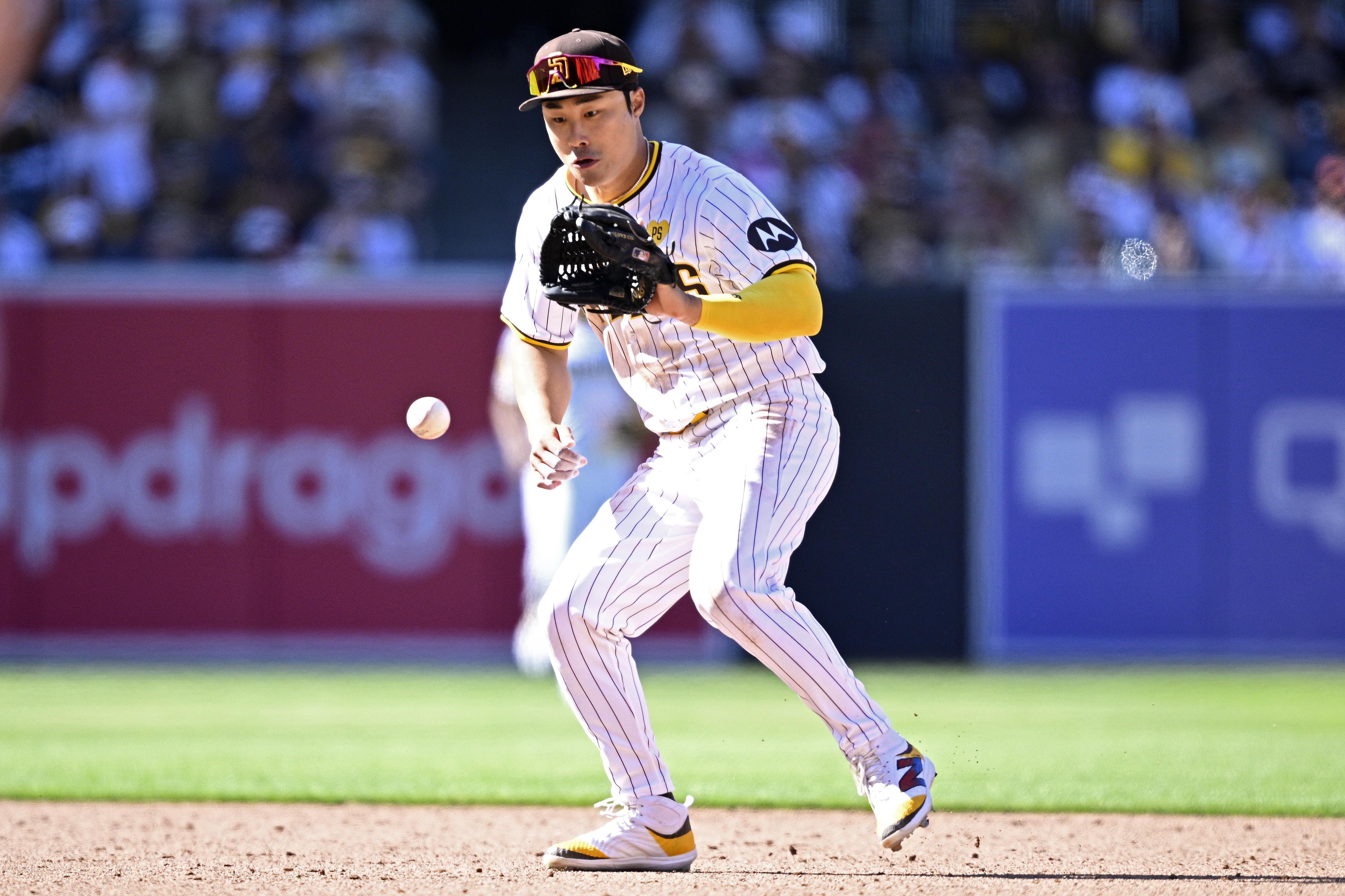 San Diego Padres shortstop Ha-Seong Kim fields a grounder.