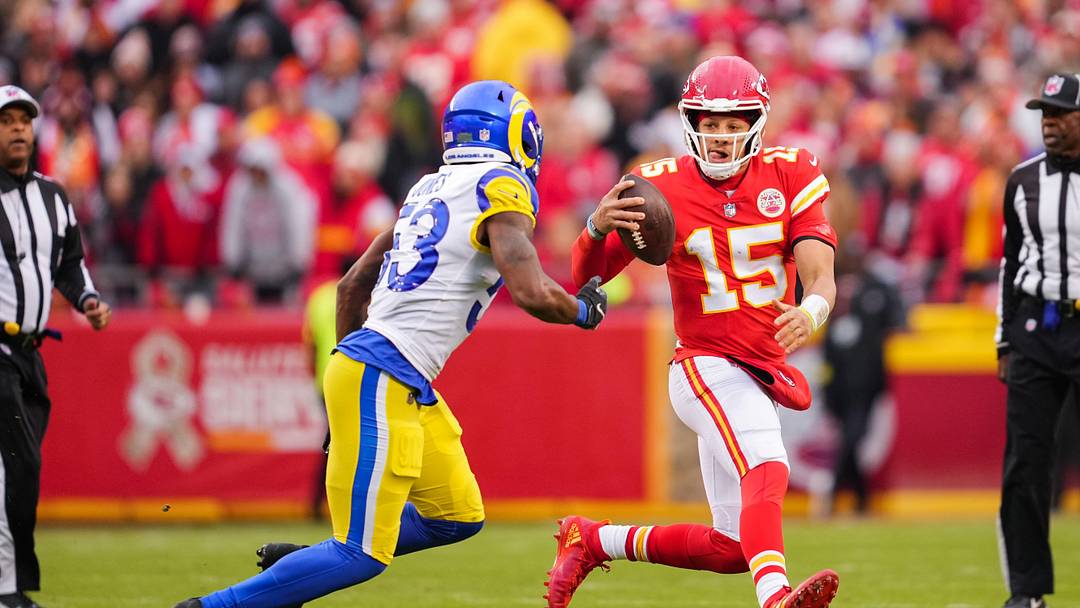 Nov 27, 2022; Kansas City, Missouri, USA; Kansas City Chiefs quarterback Patrick Mahomes (15) and Los Angeles Rams linebacker Ernest Jones (53) during the first half at GEHA Field at Arrowhead Stadium. Mandatory Credit: Jay Biggerstaff-Imagn Images Nov 27, 2022; Kansas City, Missouri, USA; Kansas City Chiefs quarterback Patrick Mahomes (15) and Los Angeles Rams linebacker Ernest Jones (53) during the first half at GEHA Field at Arrowhead Stadium. Mandatory Credit: Jay Biggerstaff-Imagn Images