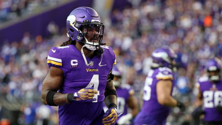 Minnesota Vikings running back Dalvin Cook (4) runs on the field during warmups before a wild card game against the New York Giants at U.S. Bank Stadium.