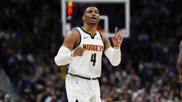Jan 1, 2025; Denver, Colorado, USA; Denver Nuggets guard Russell Westbrook (4) calls out in the second half against the Atlanta Hawks at Ball Arena. Mandatory Credit: Ron Chenoy-Imagn Images