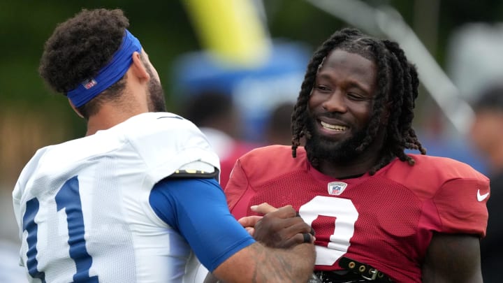 Indianapolis Colts wide receiver Michael Pittman Jr. (11) greets Arizona Cardinals wide receiver Zach Pascal (0) during a joint practice Thursday, Aug. 15, 2024, at Grand Park Sports Complex in Westfield.