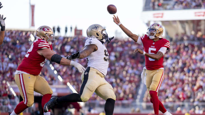 August 18, 2024; Santa Clara, California, USA; San Francisco 49ers quarterback Joshua Dobbs (5) passes the football against the New Orleans Saints during the second quarter at Levi's Stadium. Mandatory Credit: Kyle Terada-USA TODAY Sports