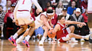 Indiana Hoosiers guard Trey Galloway (32) chases down a loose ball in front of Miami (Oh) Redhawks guard Peter Suder (5) during the first half at Simon Skjodt Assembly Hall.