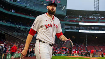 Boston Red Sox pitcher Lucas Giolito (54) makes his way to the bullpen before the start of the game against the Texas Rangers at Fenway Park.