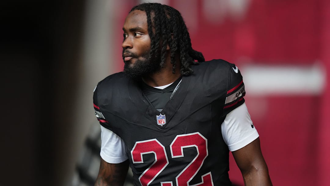 Arizona Cardinals running back Michael Carter (22) takes the field before their game against the San Francisco 49ers at State Farm Stadium on Glendale on Nov. 16, 2025.