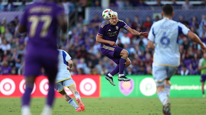 Nov 24, 2024; Orlando, Florida, USA; Orlando City defender Robin Jansson (6) heads the ball during the second half against Atlanta United in a 2024 MLS Cup conference semifinal match at Inter&Co Stadium. Mandatory Credit: Nathan Ray Seebeck-Imagn Images