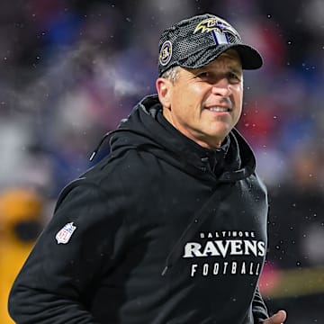 Jan 19, 2025; Orchard Park, New York, USA; Baltimore Ravens head coach John Harbaugh enters the field before a 2025 AFC divisional round game against the Buffalo Bills at Highmark Stadium. Mandatory Credit: Mark Konezny-Imagn Images