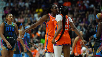 Jun 6, 2025; Uncasville, Connecticut, USA; Connecticut Sun center Tina Charles (31) and forward Aneesah Morrow (24) react after a play against the Atlanta Dream in the second half at Mohegan Sun Arena.