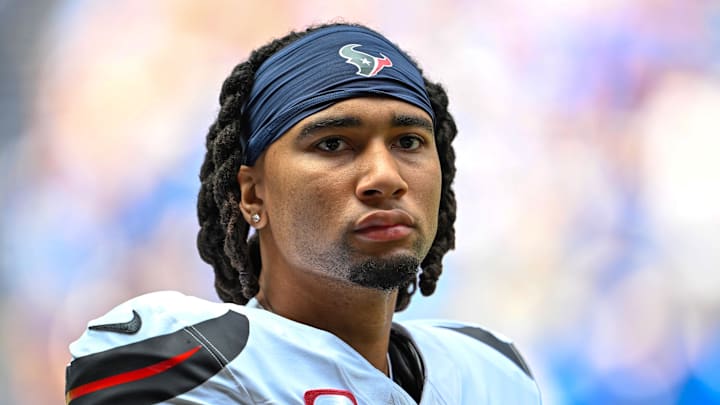 Sep 8, 2024; Indianapolis, Indiana, USA; Houston Texans quarterback C.J. Stroud (7) stands on the sidelines before the game against the Indianapolis Colts at Lucas Oil Stadium. Mandatory Credit: Marc Lebryk-Imagn Images