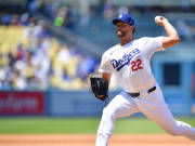 Jul 25, 2024; Los Angeles, California, USA; Los Angeles Dodgers starting pitcher Clayton Kershaw (22) throws against the San Francisco Giants during the fourth inning at Dodger Stadium. Mandatory Credit: Gary A. Vasquez-USA TODAY Sports