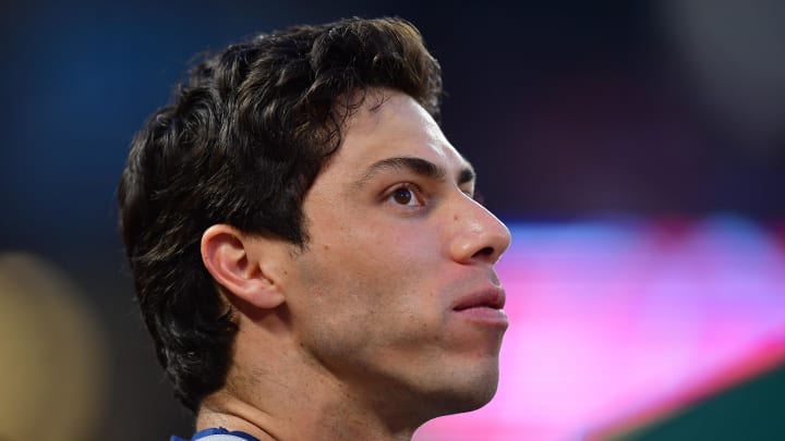 Jun 18, 2024; Anaheim, California, USA; Milwaukee Brewers outfielder Christian Yelich (22) watches game action against the Los Angeles Angels during the sixth inning at Angel Stadium. Mandatory Credit: Gary A. Vasquez-USA TODAY Sports