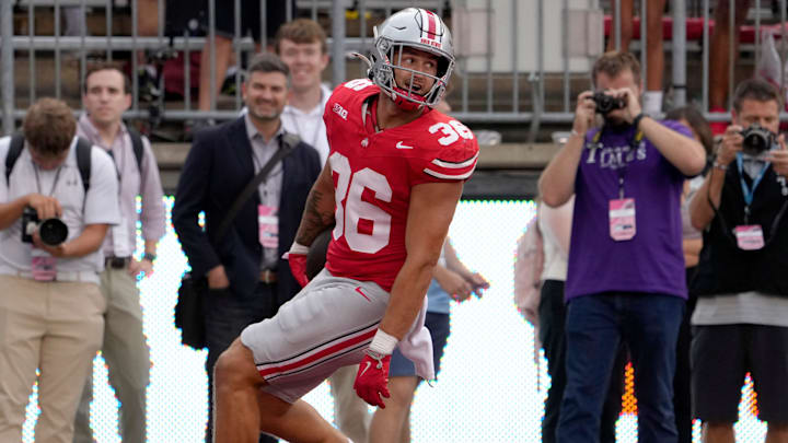 August 31, 2024; Columbus, Ohio, USA;
Ohio State Buckeyes linebacker Gabe Powers (36) runs back an interception for a touchdown during the second half of Saturday’s NCAA Division I football game against the Akron Zips at Ohio Stadium.