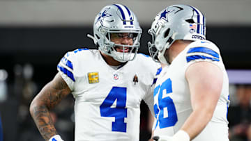 Nov 17, 2025; Paradise, Nevada, USA; Dallas Cowboys quarterback Dak Prescott (4) and center Cooper Beebe (56) warm up prior to a game against the Las Vegas Raiders at Allegiant Stadium. Mandatory Credit: Stephen R. Sylvanie-Imagn Images