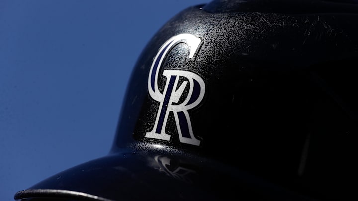 Aug 20, 2023; Denver, Colorado, USA; A detail view of a Colorado Rockies batting helmet in the seventh inning against the Chicago White Sox at Coors Field. 
