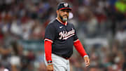 Aug 24, 2024; Atlanta, Georgia, USA; Washington Nationals manager Dave Martinez (4) makes a pitching change against the Atlanta Braves in the sixth inning at Truist Park.