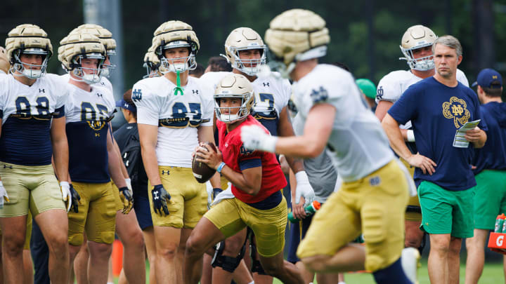 Notre Dame quarterback Kenny Minchey looks for an open receiver during a Notre Dame football practice at Irish Athletic Center on Tuesday, Aug. 6, 2024, in South Bend.