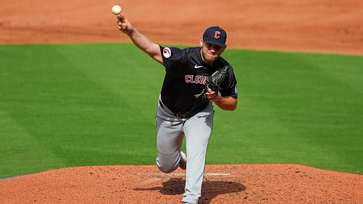 Sep 2, 2024; Kansas City, Missouri, USA; Cleveland Guardians starting pitcher Gavin Williams (32) pitches during the third inning against the Kansas City Royals at Kauffman Stadium.